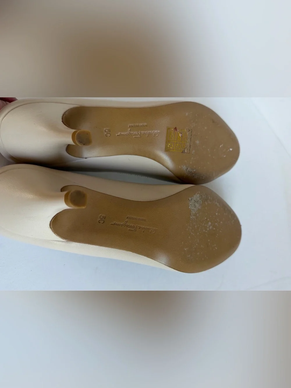 Salvatore Ferragamo Cream Vara Bow Flats with Gold Chain Accent